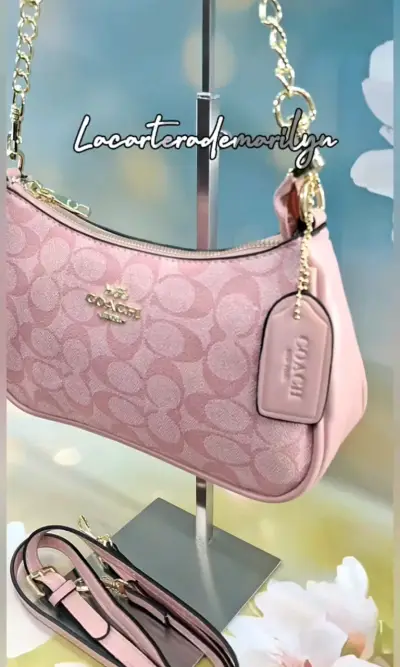 Cartera Coach rosa con correa ajustable - miniatura 6