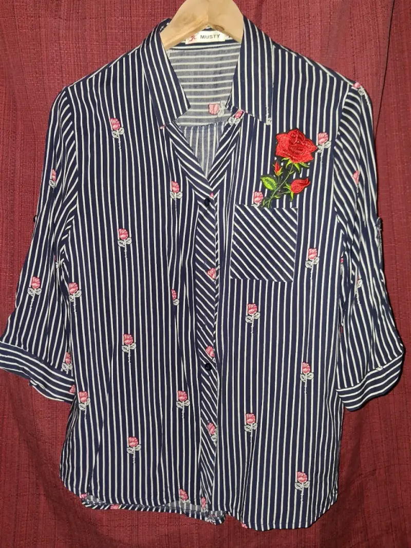 Blusa de rayas con bordado floral - 3