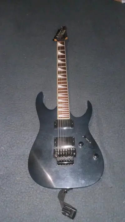 Guitarra eléctrica Ibanez GIO con puente flotant - miniatura 1