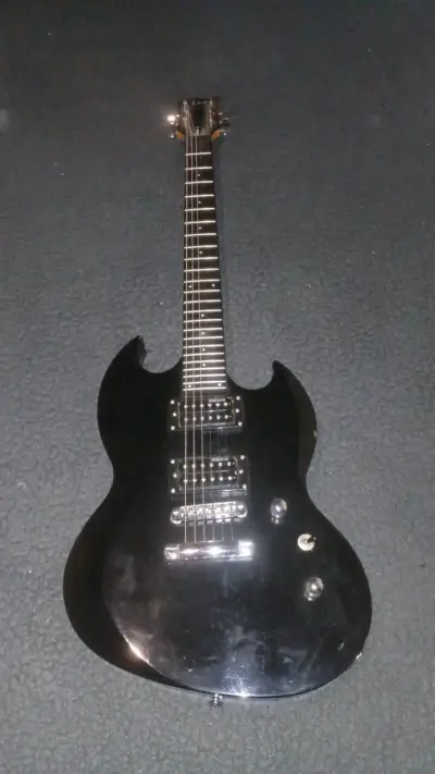 Guitarra eléctrica LTD negra estilo SG - miniatura 1