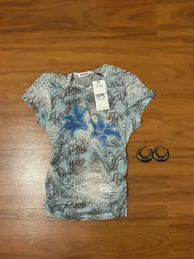 Polera estampada animal print Opposite + aros - miniatura 1