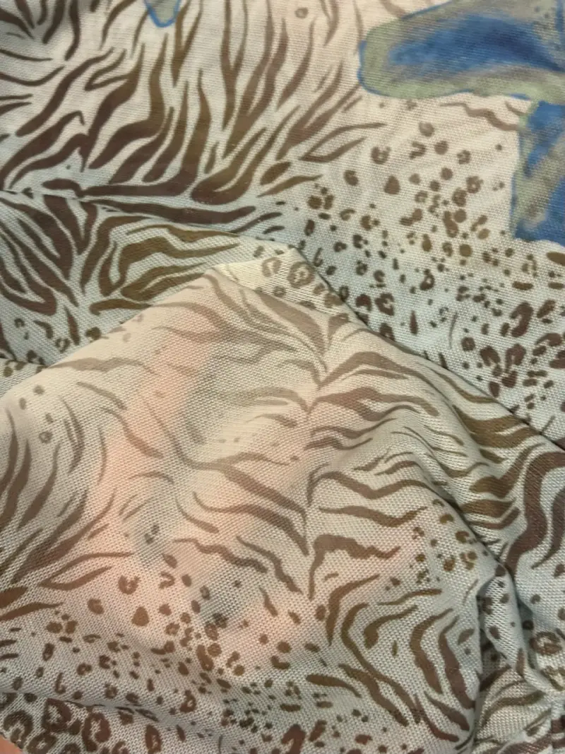 Polera estampada animal print Opposite + aros - 4