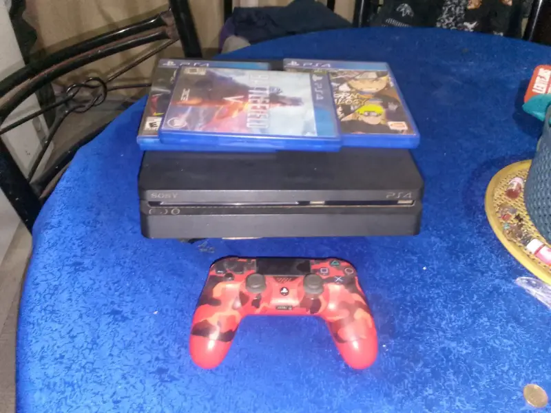 Consola PS4 con juegos y control camuflado - 2