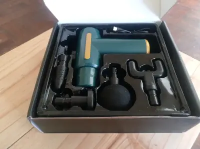 Pistola de Masaje Muscular Portátil con Accesorios - miniatura 1