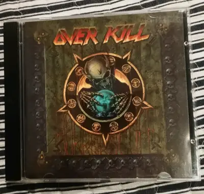 CD de música Overkill con portada llamativa - miniatura 1