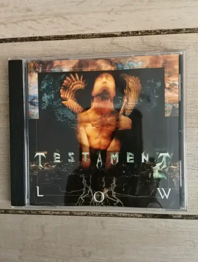 CD de música 'Low' de Testament en buen estado - miniatura 1