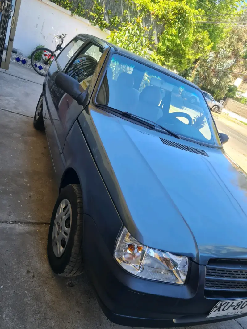 Auto Fiat Uno Fire en buen estado - 3