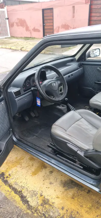 Auto Fiat Uno Fire en buen estado - miniatura 5