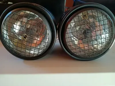 Faros auxiliares redondos con rejilla - miniatura 1