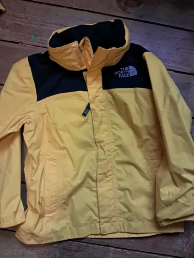 Chaqueta impermeable amarilla The North Face - miniatura 1