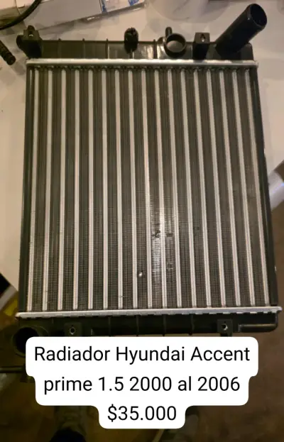 Radiador Hyundai Accent Prime 1.5 2000-2006 - miniatura 1