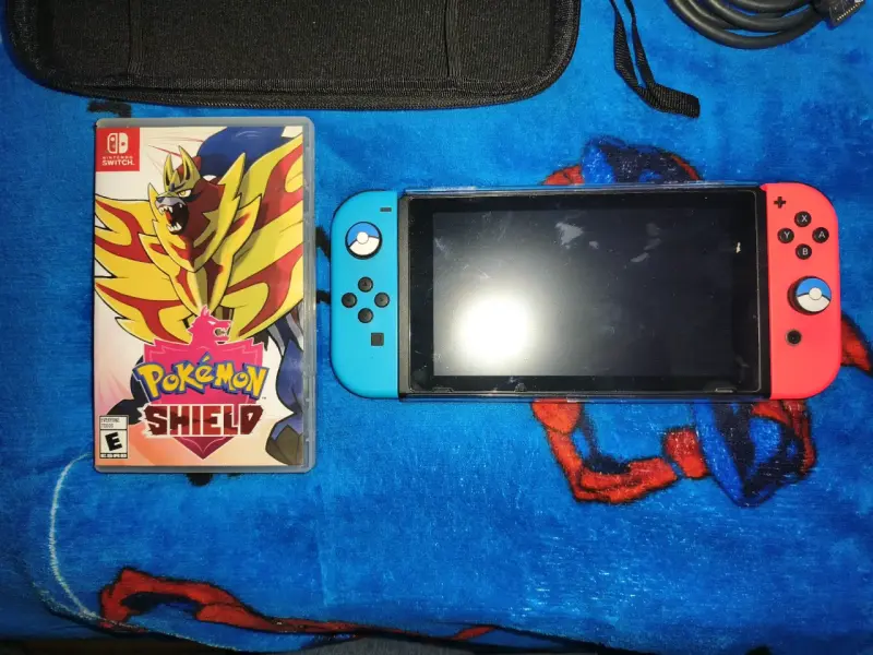 Consola Nintendo Switch con accesorios y juego - 4
