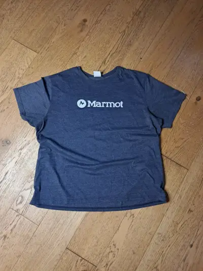 Polera azul Marmot para hombre - miniatura 1