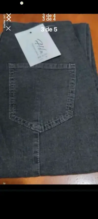 Jeans ajustados negros de mujer con botones - miniatura 2