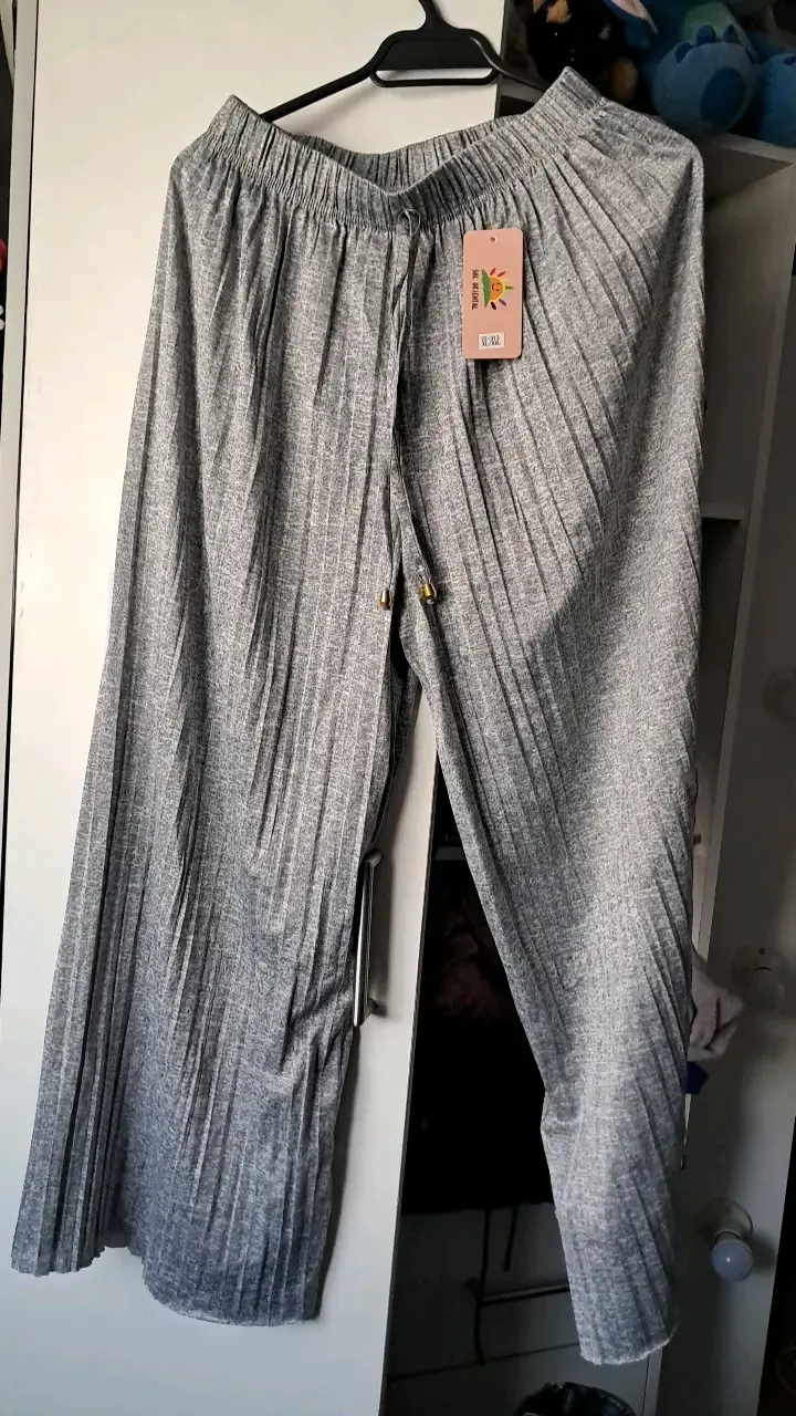 Pantalones plisados grises Sol Oriental - 1
