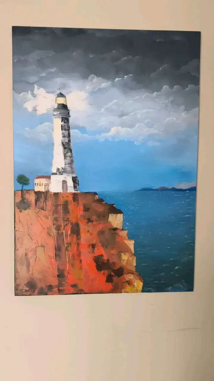 Cuadro de faro en acantilado pintado al óleo s/tel