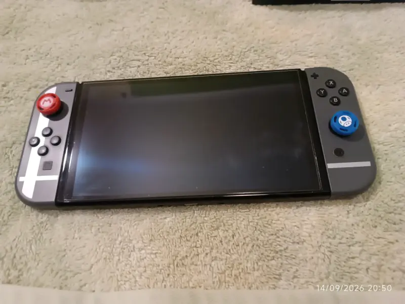 Nintendo switch Oled + Mario party + accesorios. - 2