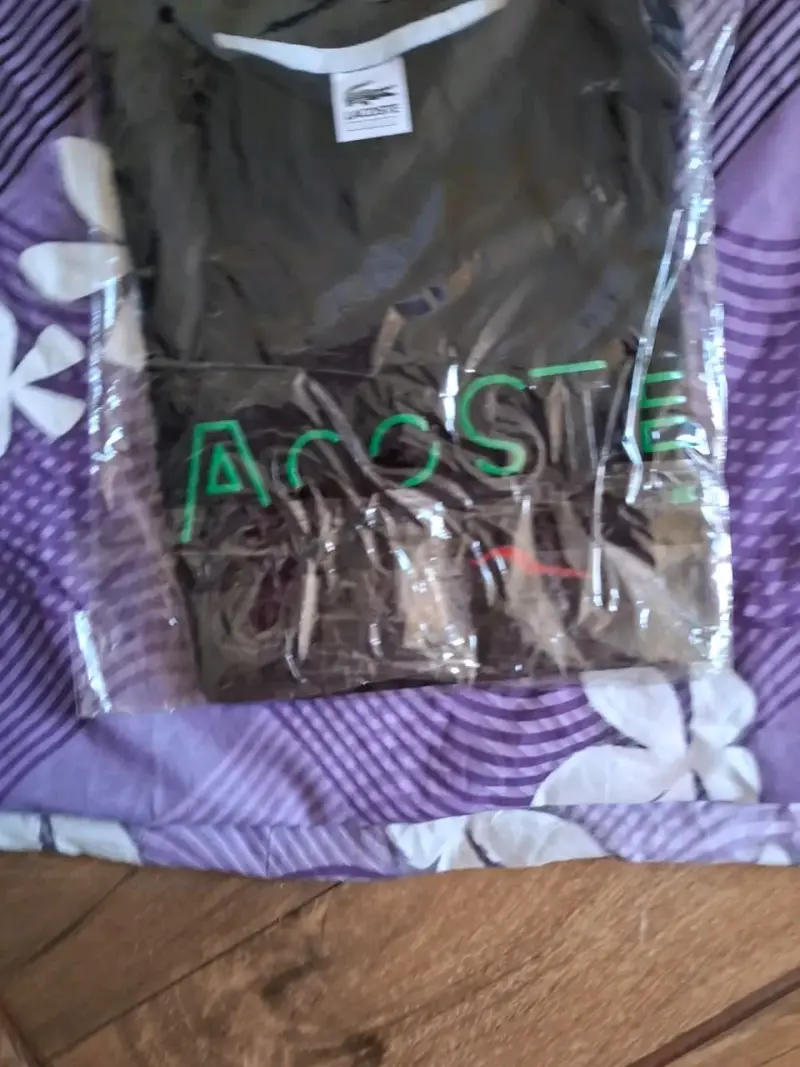 Polera Lacoste negra con logo - 1