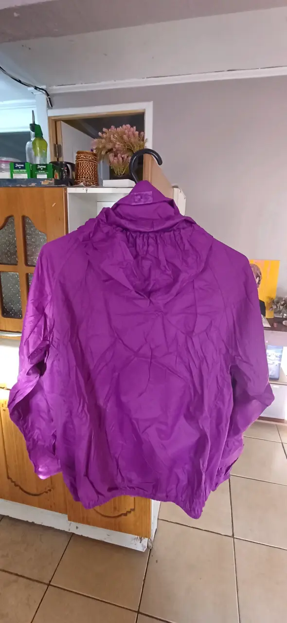 Chaqueta cortaviento morada New Balance - 2