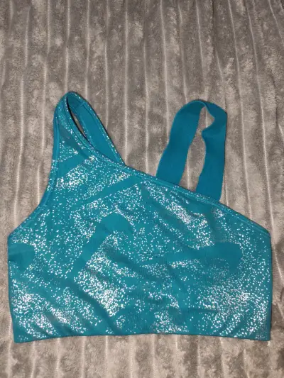Top deportivo azul con brillo Nike - miniatura 1