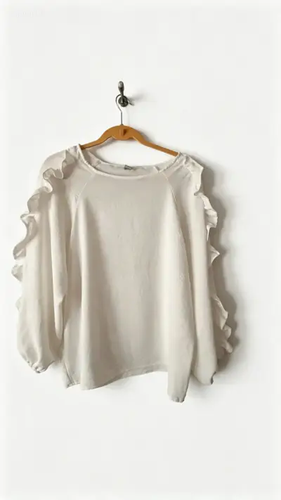 Blusa blanca con volantes - miniatura 4