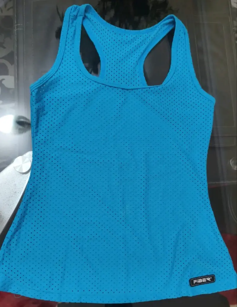 Polera deportiva azul sin mangas Fiber