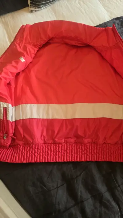 Chaleco acolchado rojo Nike para hombre - miniatura 1