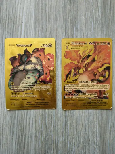 Cartas Pokémon Volcarona V y Charizard VMAX Gold - miniatura 1