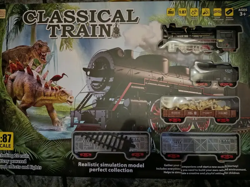 Tren de Juguete Clásico con Dinosaurios y Efectos - 1