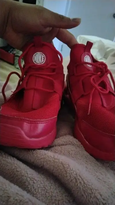 Zapatillas deportivas rojas Nike para hombre - miniatura 1