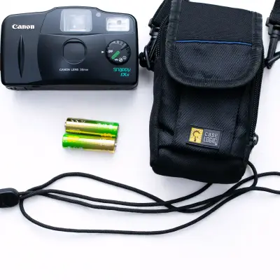 Cámara Canon Snappy LXII con funda y pilas - miniatura 1