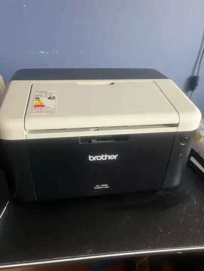 Impresora láser Brother HL-1202 en buen estado - miniatura 1
