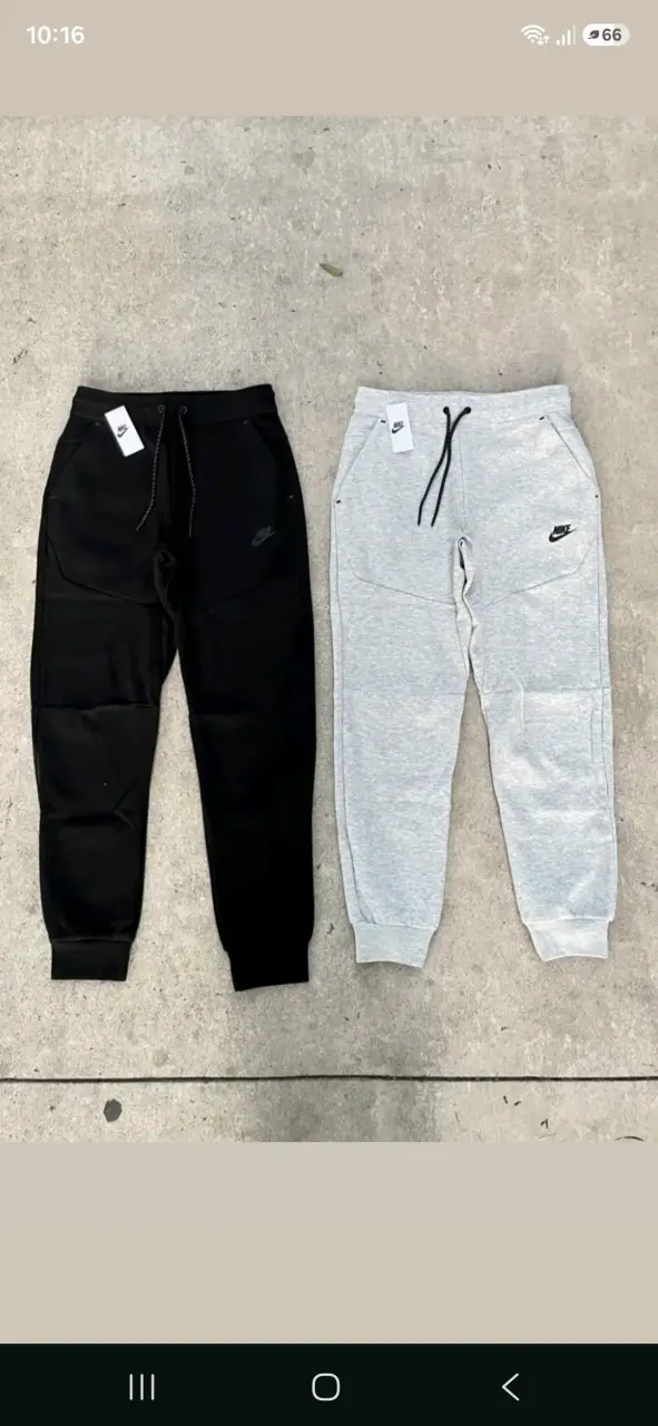 Pantalones deportivos Nike en negro y gris - 1