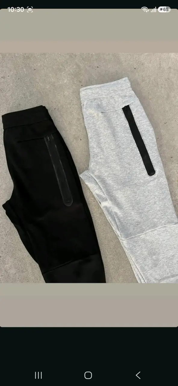 Pantalones deportivos Nike en negro y gris - 2