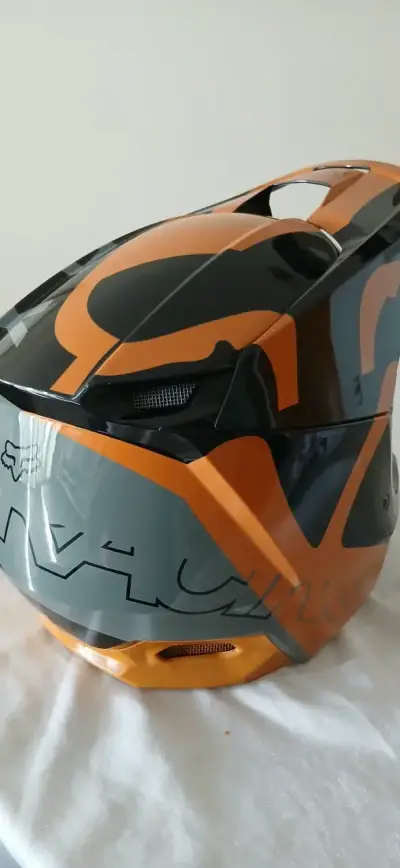 Casco de motocross Fox  V1 negro y naranja - miniatura 2