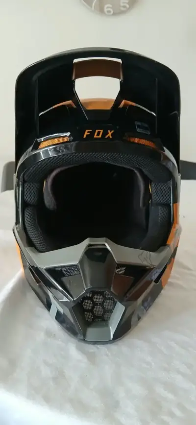 Casco de motocross Fox  V1 negro y naranja - miniatura 3
