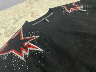 Suéter negro con diseño de estrellas Barbados XS - miniatura 1