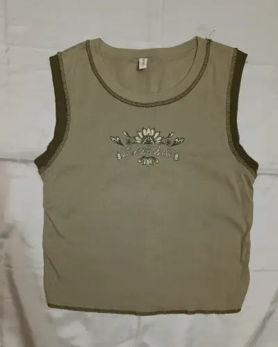 Polera sin mangas beige con diseño floral - miniatura 1