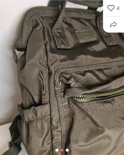 Mochila de nylon color marrón con bolsillos - miniatura 1