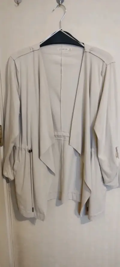 1. Tapado Beige Liviano y Versátil - miniatura 1
