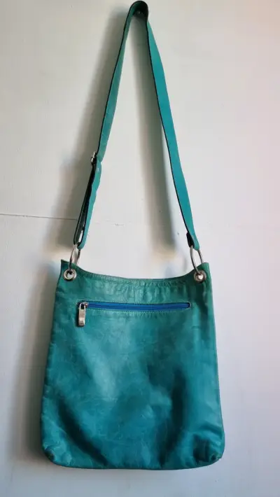 Cartera cruzada de cuero turquesa - miniatura 1