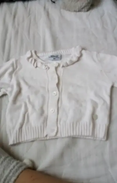 Conjunto de ropa para bebé en tonos pastel - miniatura 1