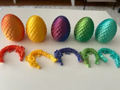 Huevos de dragón decorativos con figuras - miniatura 1