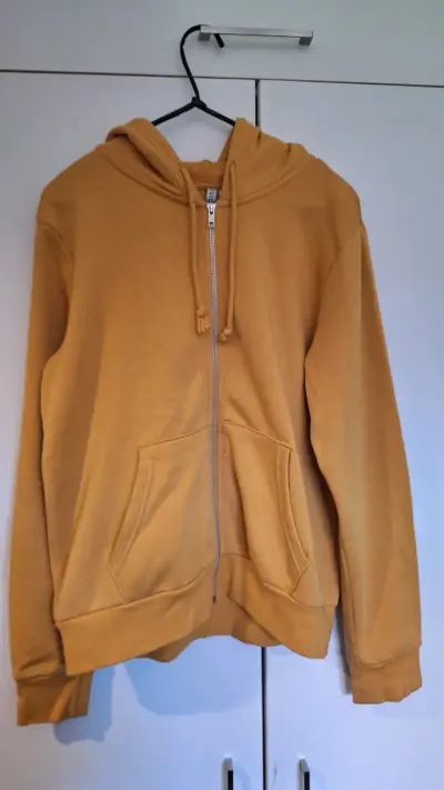 Polerón con capucha amarillo mostaza unisex - miniatura 1