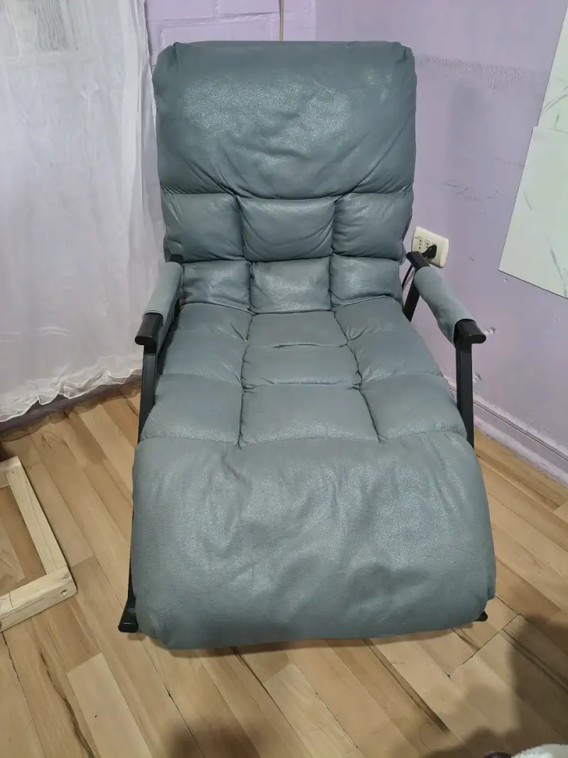 Sillón reclinable gris en buen estado