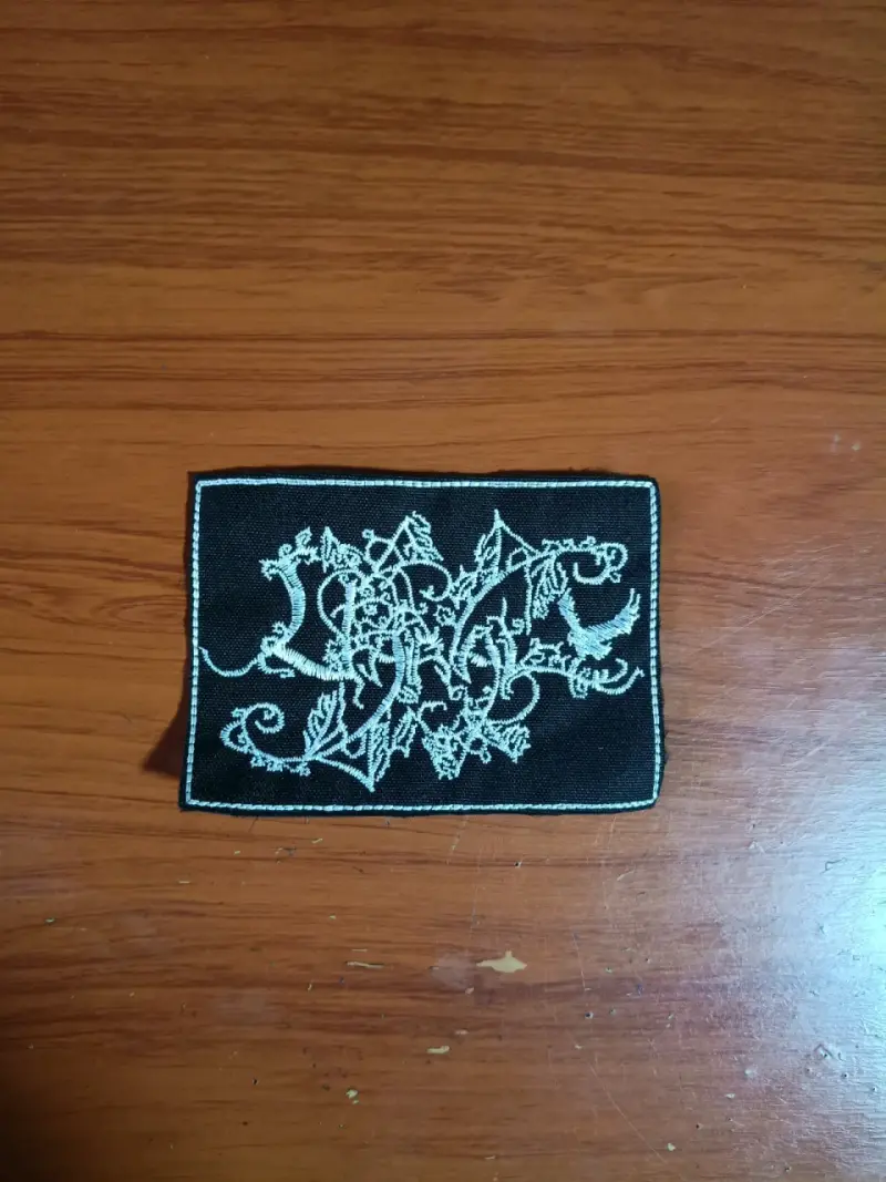 Parche bordado con diseño de la banda UARAL