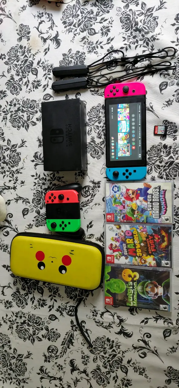 Consola Nintendo Switch con juegos y accesorios - 1