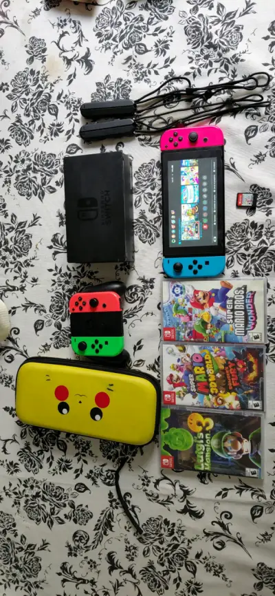 Consola Nintendo Switch con juegos y accesorios - miniatura 1