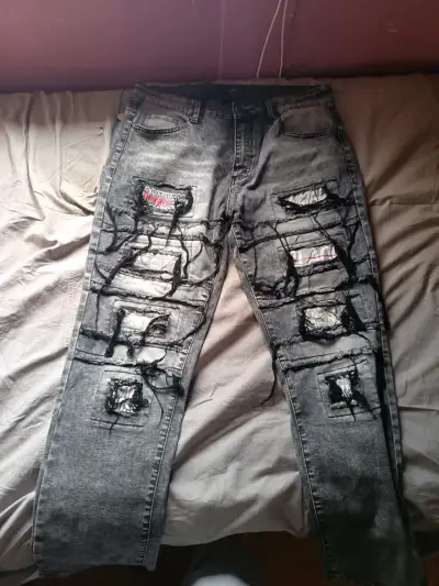 Jeans rasgados gris oscuro estilo urbano - miniatura 1