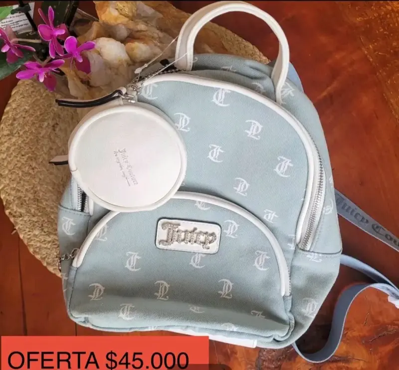 Mochila Juicy Couture azul con monedero